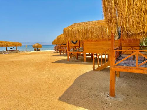 Love beach camp in Qesm Nwebaa