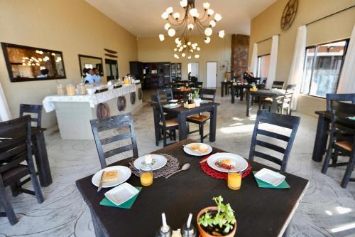 Restaurant, River Crossing Lodge in Windhoek