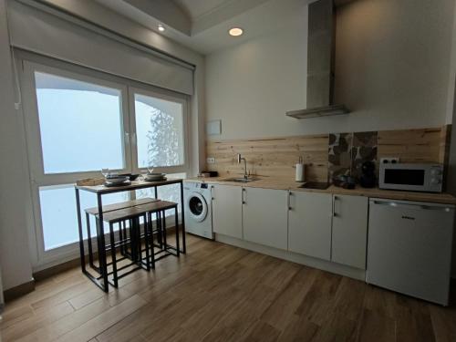 廚房, Apartamentos La Muralla in 聖多明各德拉卡爾薩達