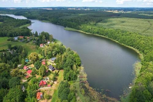 Holiday Home by Lake Kl pnicko with Pier