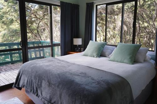 Okupu Beach House in เกาะเกรทแบร์ริเออร์