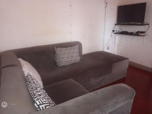 Koplietošanas atpūtas telpa ar TV, Andy's home stay in Masindi
