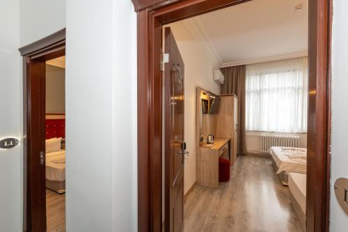 Family Room with Balcony room in Olimpic Hotel