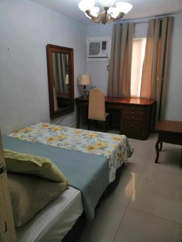 Royale 2BR Condo unit with free WiFi near Robinsons Place Imus