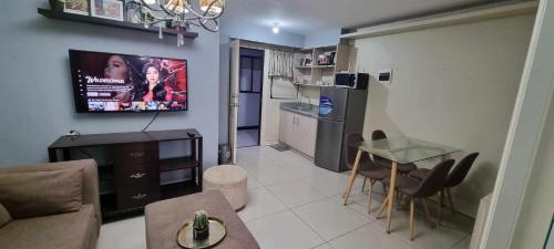 Elegant 2BR Condo unit with free WiFi near Robinsons Place Imus
