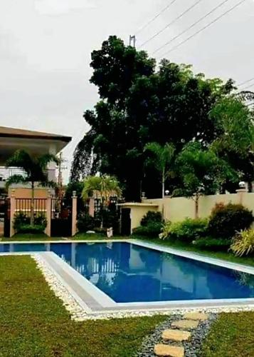 Elegant 2BR Condo unit with free WiFi near Robinsons Place Imus