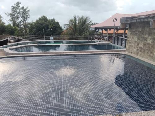 Swimming pool, RIVER SIDE CHALET TIOMAN in Kampung Genting