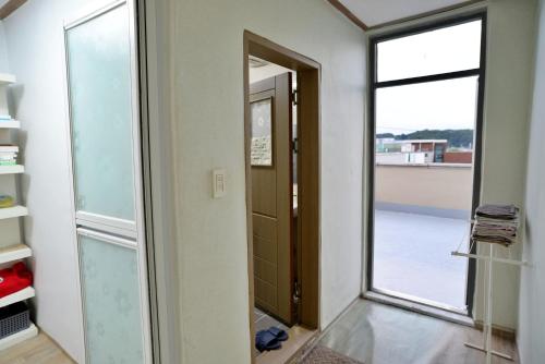 江陵 Cozy Home at Gangneung Central Market 3つ星 ゲストハウス プール