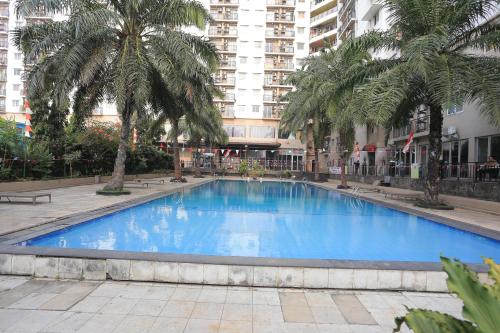 Piscina, Collection O Serviced Apartmen Mutiara Kota in South Bekasi