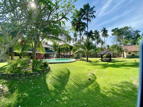 Oceana Hotel & Beach Resort near Aninuan Falls