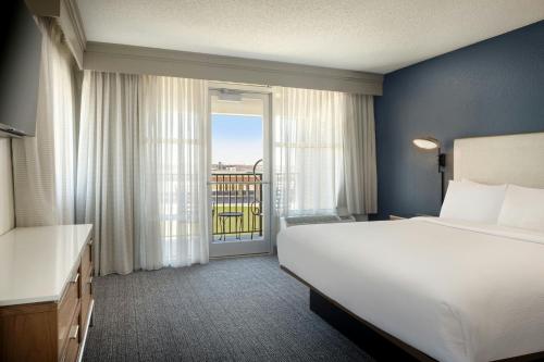 King Room with Sofa Bed and Roll-in Shower - Mobility and Hearing Accessible