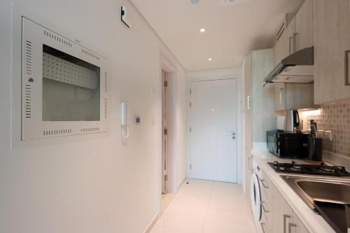 Exquisite Studio near Nakheel Mall by Livbnb, Dubái (foto 8)