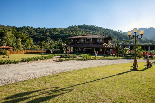 Casa da Família no Sítio Mannes (Casa da Familia no Sitio Mannes) in São Pedro De Alcântara