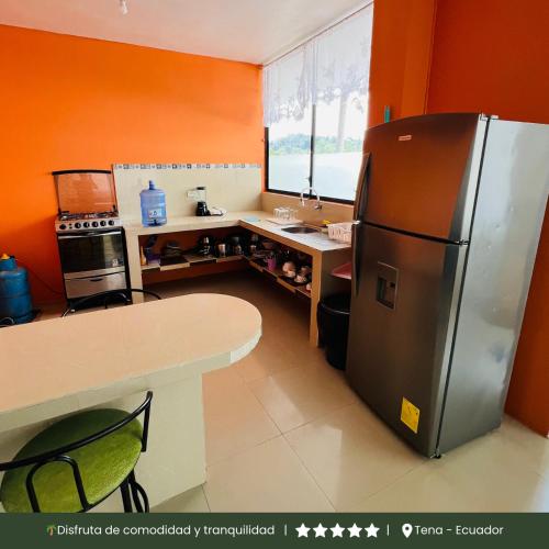 Kitchen, RinaKawsay - ViveViajando Apartamento amoblado en Tena in Tena