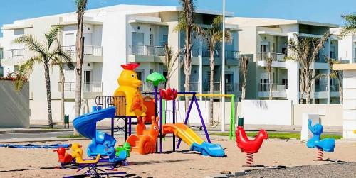 Parque infantil, Cosy Apartment with sea view in Sidi Rahal