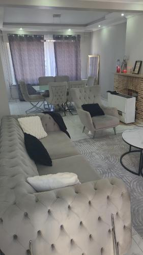 Une Maison chaleureuse Une Maison chaleureuse