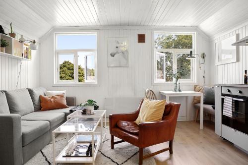 Lys and fin loftsleilighet in แดรมเมน