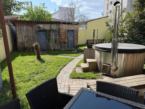 Du calme en pleine ville Jacuzzi - quartier du Grand Parc