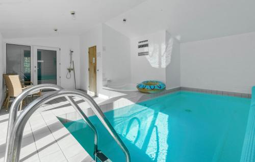 Swimming pool, Four-Bedroom Holiday Home In Ebeltoft in Ebeltoft