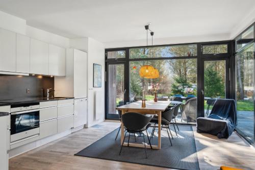 Exterior view, 8-Person Holiday Home In Fuglslev With Indoor And Outdoor Spa, Sauna And Large Annex Surrounded By F in Fuglslev