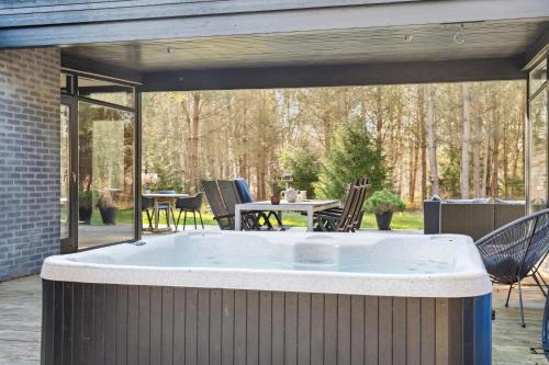 Exterior view, 8-Person Holiday Home In Fuglslev With Indoor And Outdoor Spa, Sauna And Large Annex Surrounded By F in Fuglslev