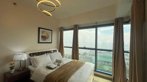2BR Grand Riviera Suites by MrSayla, Manila (photo 6)