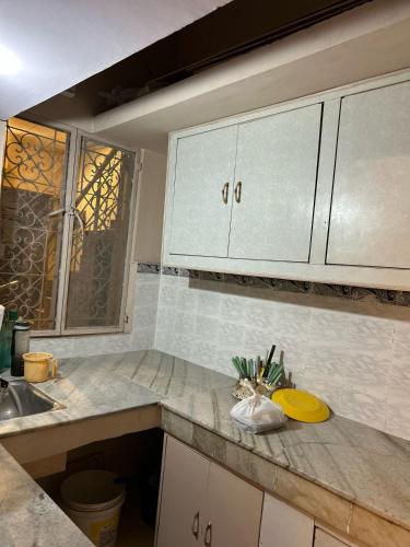 Kitchen, SREA Homestead Dormitory in New Delhi