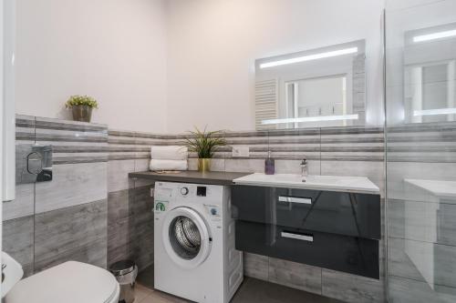 Banheiro, Grobla by Loft Apartments in Long Gardens