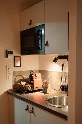 köök, Appart'hôtel Le Corot - Accès Autonome - Saint-Junien Centre (Appart'hotel Le Corot - Acces Autonome - Saint-Junien Centre) in Saint-Junien