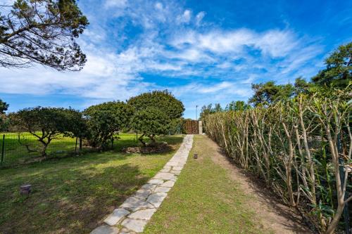 Villa Esclusiva con 600Mq di Giardino sulla Spiaggia della Pelosa