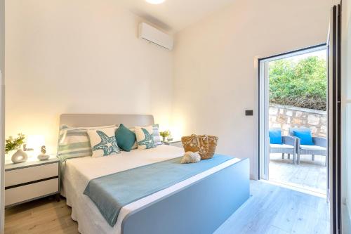 SARDINIA RE - Porto Conte Blue Bay