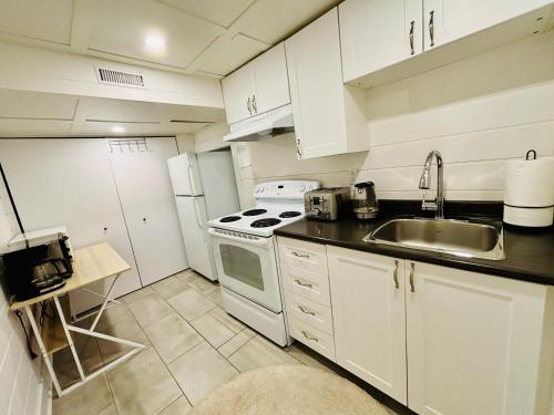 Kitchen, Opulent Studio - Semi Basement in LaSalle