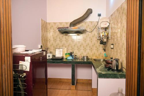 Shared lounge/TV area, Ichhamati Homestay in Bolpur