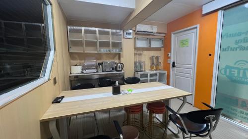 Restaurante, Golden mango home Youth hostel 金芒果之家青年旅舍 in Ratchada