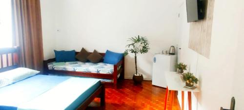 Quarto Privativo Praia das Pitangueiras near Bar e Lanches Guaruja Tropical