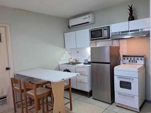 Kitchen, Apartamento Vacacional Playa Grande in Maiquetía