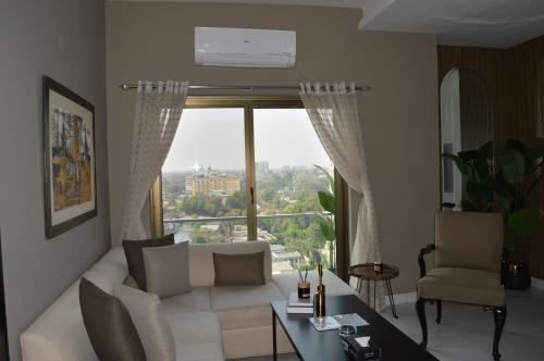 2 Bedroom Luxury Apartment - The Opus Luxury Residences by Book N Rent - main image