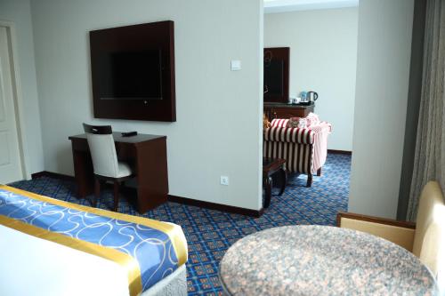 Executive Suite room in Ramee Guestline Hotel