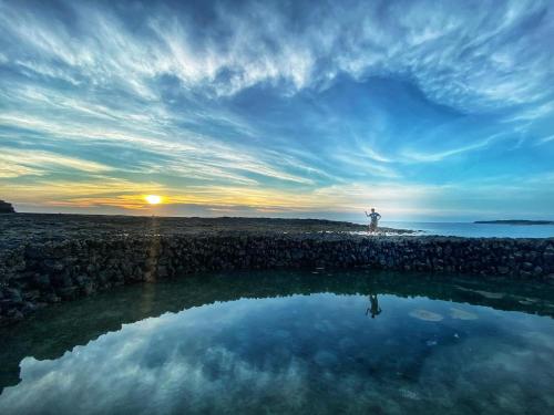 Beach, Ocean Nap Island Stay near Wind Power Plant