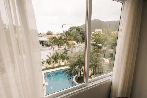 Jardim do Rio Suítes (Jardim do Rio Suites) in เซาชูเอา โดริโอเวร์เมลโย