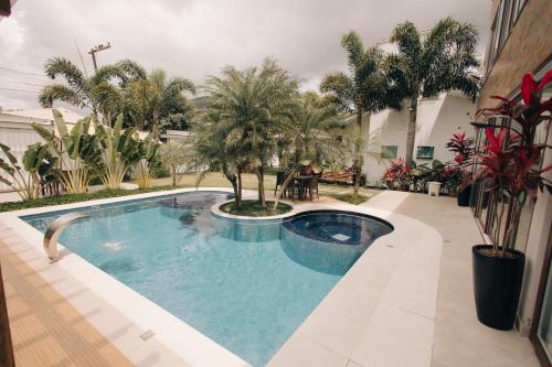 Jardim do Rio Suítes (Jardim do Rio Suites) in เซาชูเอา โดริโอเวร์เมลโย