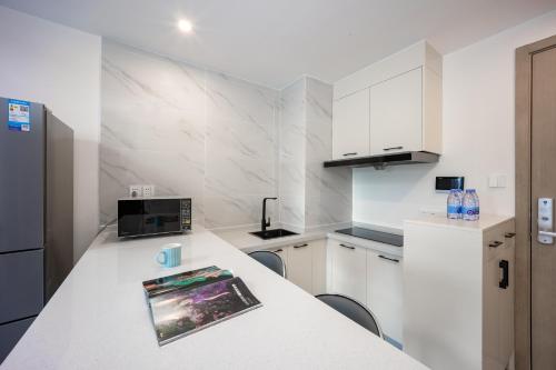 Ode to Joy Hotel Apartment East Railway Station Guanghuan Shopping Park Branch - image 2