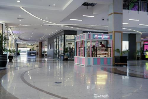 Gold Crest Mall Luxury Apartments with Balcony by Prime Lodging in DHA Lahore - image 10