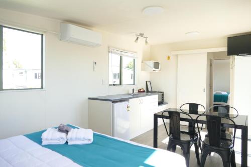 Whakatane Holiday Park - Tap to explore photos