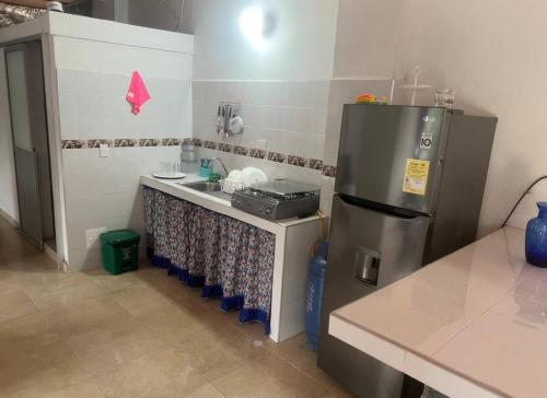 Kitchen, Casa Florida campestre in Boqueron