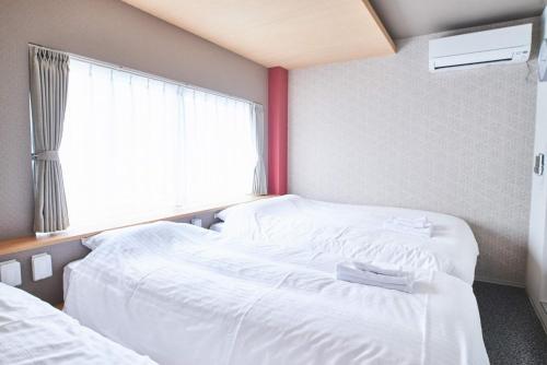 Quadruple Room with Private Bathroom room in WELLSTAY Osaka Shinsaibashi Apartment hotel