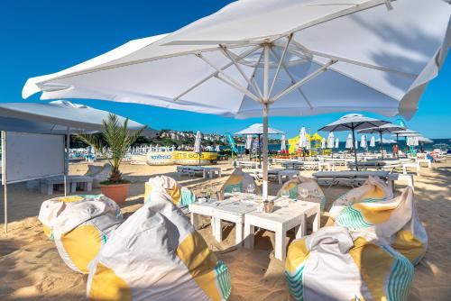 Апартаменти с чадъри и шезлонги на плажа - Свети Никола Каваците, Sozopol (fotografie 9)