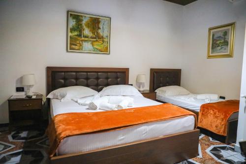 Deluxe Double Room (2 Adults + 1 Child) room in Villa Palma Center