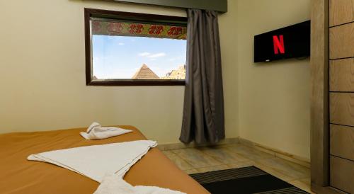 Enjoy with NEFERTIT pyramids view