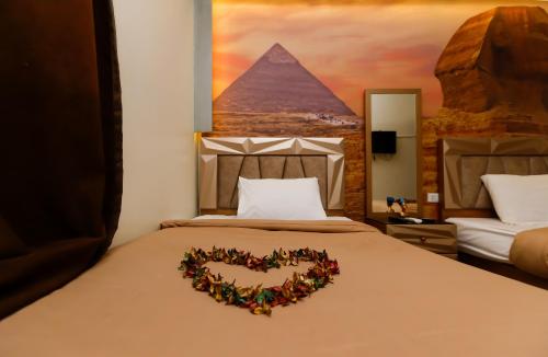 Enjoy with NEFERTIT pyramids view